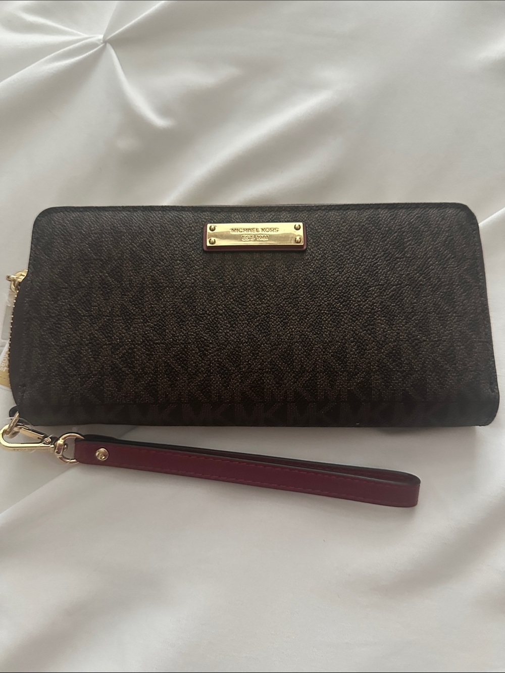 Brand new Michael Kors Brown Logo Zip-Around Wristlet with wrist strap